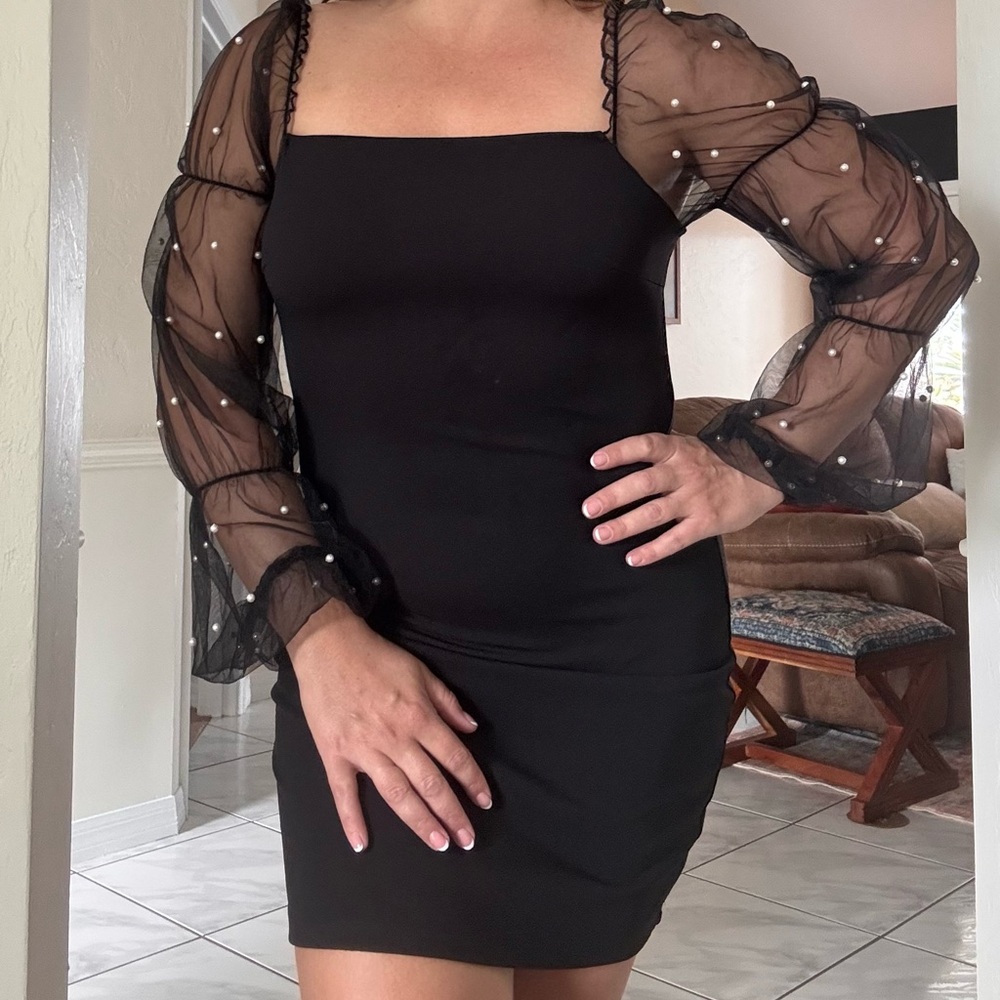Elegant Black Dress with Sheer Sleeves